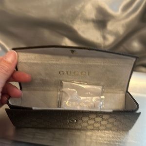 Gucci eyeglass case.